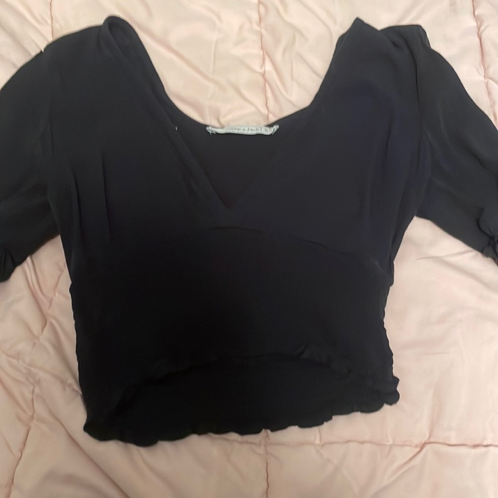 It is more of a dressy shirt. It is an xs.